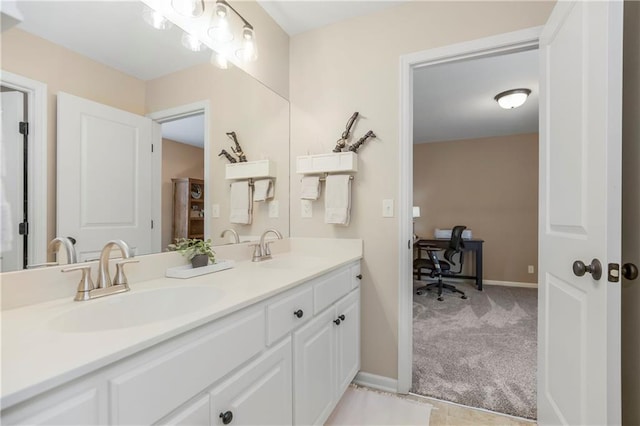 21222 W 46th Ter, Shawnee, KS 66218 - bathroom featuring double vanity and baseboards