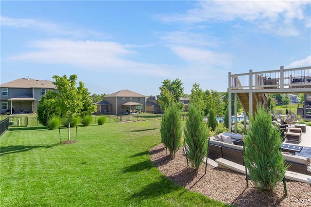 21222 W 46th Ter, Shawnee, KS 66218 - fenced backyard with a wooden deck, an outdoor living space, and a residential view