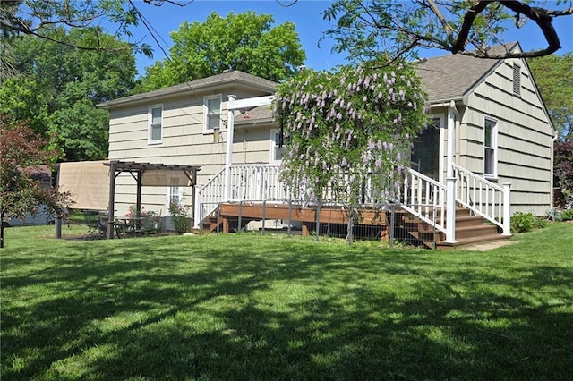 8101 E 133rd Ter, Grandview, MO 64030 - rear view of property featuring a lawn, roof with shingles, and a deck