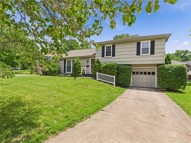 8101 E 133rd Ter, Grandview, MO 64030 - tri-level home with an attached garage, driveway, and a front lawn