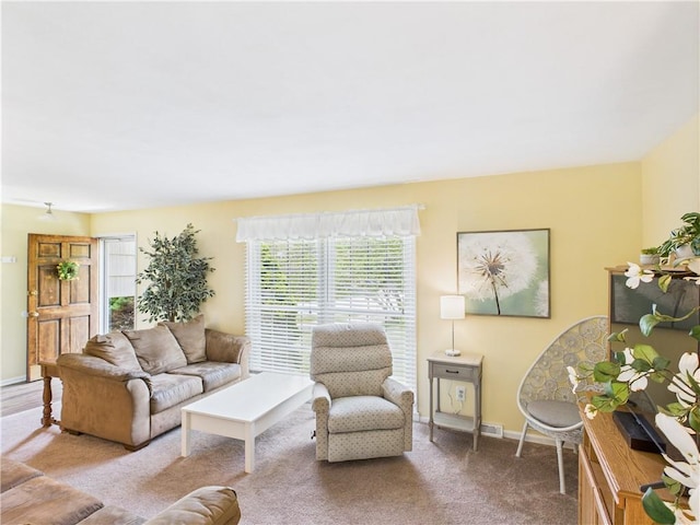8101 E 133rd Ter, Grandview, MO 64030 - carpeted living area with baseboards