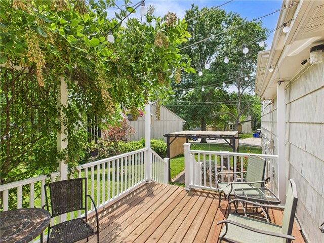 8101 E 133rd Ter, Grandview, MO 64030 - wooden deck with a lawn