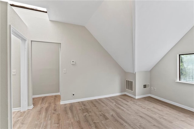 803 E College St, Independence, MO 64050 - bonus room featuring vaulted ceiling, light wood-style floors, and baseboards