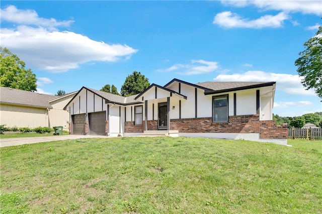 11704 E 76th Ter, Raytown, MO 64138 - view of front facade featuring brick siding, driveway, and an attached garage