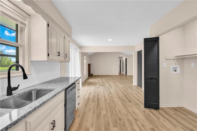11704 E 76th Ter, Raytown, MO 64138 - kitchen featuring a sink, dishwasher, plenty of natural light, decorative backsplash, and recessed lighting