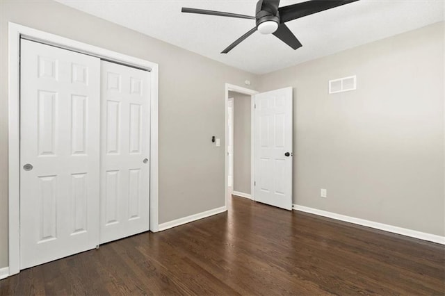 9741 Walnut St, Kansas City, MO 64114 - unfurnished bedroom featuring wood finished floors, a closet, and ceiling fan