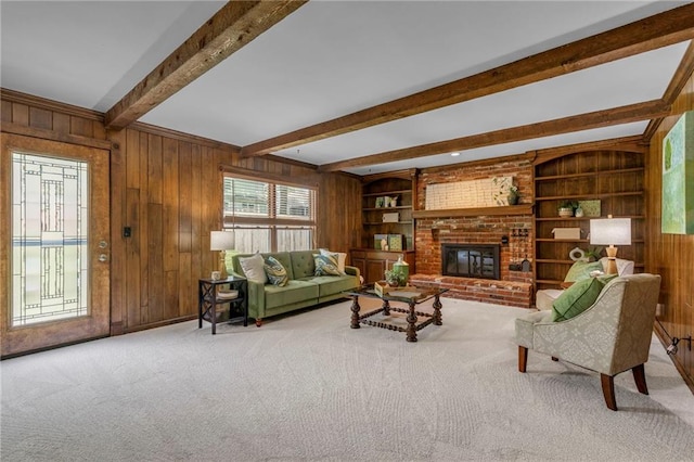 10124 Halsey St, Lenexa, KS 66215 - carpeted living area with wooden walls, beam ceiling, a fireplace, and built in shelves