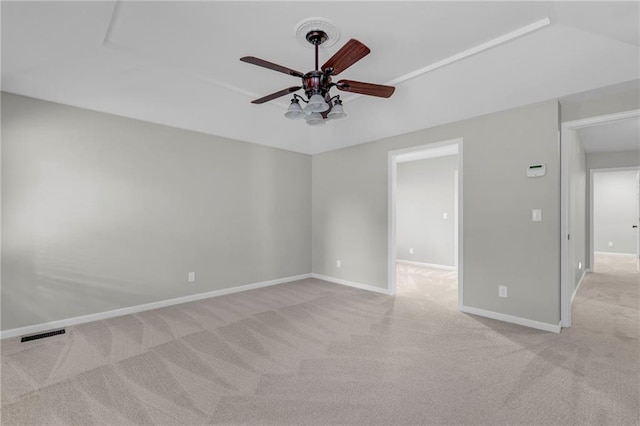 10124 Halsey St, Lenexa, KS 66215 - spare room with a ceiling fan, light carpet, and baseboards
