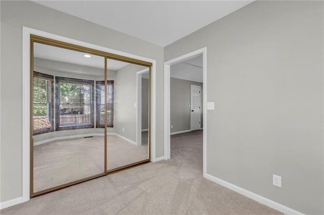 10124 Halsey St, Lenexa, KS 66215 - empty room with carpet floors and baseboards