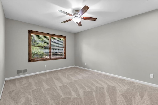 10124 Halsey St, Lenexa, KS 66215 - empty room with a ceiling fan, light carpet, and baseboards