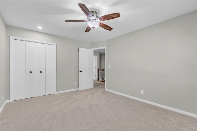 10124 Halsey St, Lenexa, KS 66215 - unfurnished bedroom with baseboards, light colored carpet, recessed lighting, a closet, and a ceiling fan
