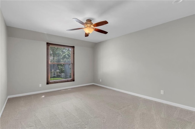 10124 Halsey St, Lenexa, KS 66215 - carpeted empty room with ceiling fan and baseboards