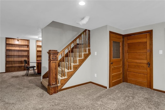 10124 Halsey St, Lenexa, KS 66215 - staircase featuring carpet floors and baseboards