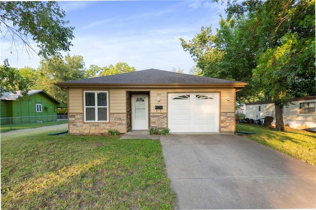 739 S Cypress St, Ottawa, KS 66067 - view of front of house featuring stone siding and driveway