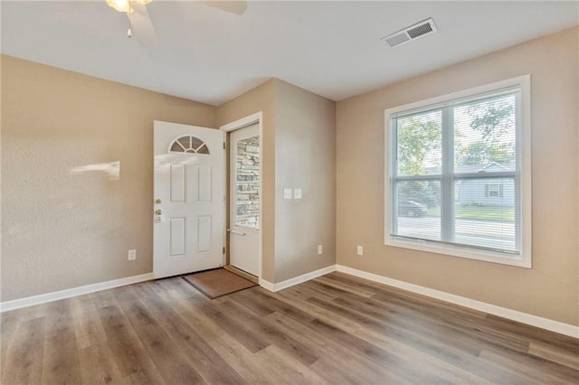 739 S Cypress St, Ottawa, KS 66067 - entrance foyer with wood finished floors and a ceiling fan