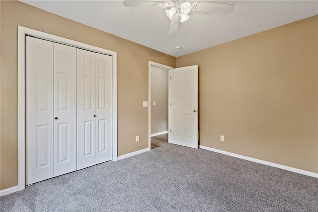 739 S Cypress St, Ottawa, KS 66067 - unfurnished bedroom with carpet floors, a closet, and ceiling fan