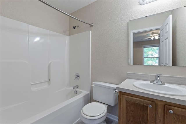 739 S Cypress St, Ottawa, KS 66067 - bathroom with vanity, shower / bathtub combination, and a textured wall
