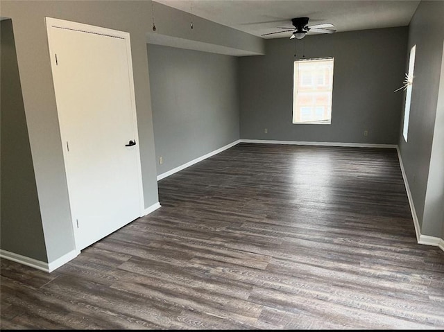 106 Saratoga St, Excelsior Springs, MO 64024 - unfurnished room with a ceiling fan and dark wood-style flooring