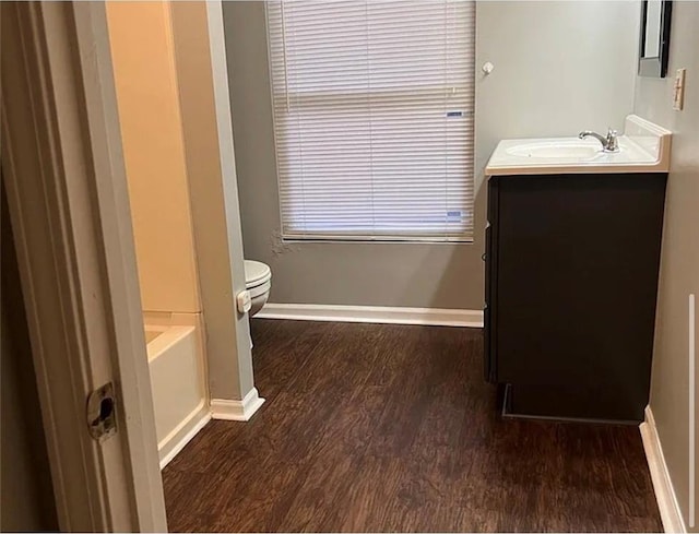 106 Saratoga St, Excelsior Springs, MO 64024 - full bath with wood finished floors and vanity