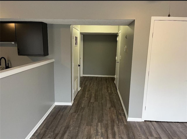 106 Saratoga St, Excelsior Springs, MO 64024 - hall with wood finished floors and baseboards