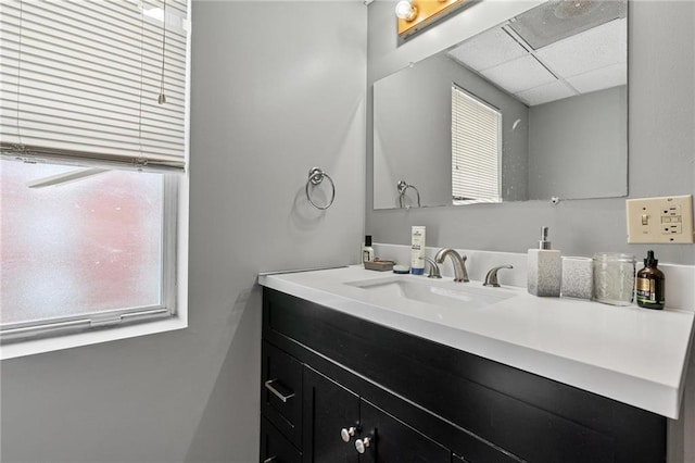 106 Saratoga St, Excelsior Springs, MO 64024 - bathroom with a drop ceiling and vanity