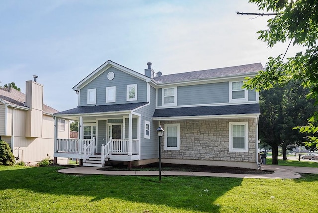 12655 S Clinton St, Olathe, KS 66061 - view of front of property featuring a porch, stone siding, a front yard, and a shingled roof