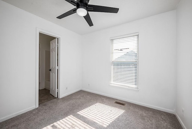 12655 S Clinton St, Olathe, KS 66061 - carpeted spare room featuring a ceiling fan and baseboards