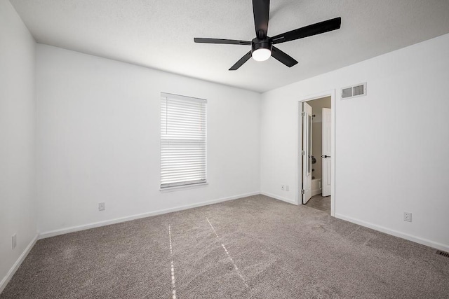 12655 S Clinton St, Olathe, KS 66061 - empty room featuring ceiling fan, carpet flooring, and baseboards