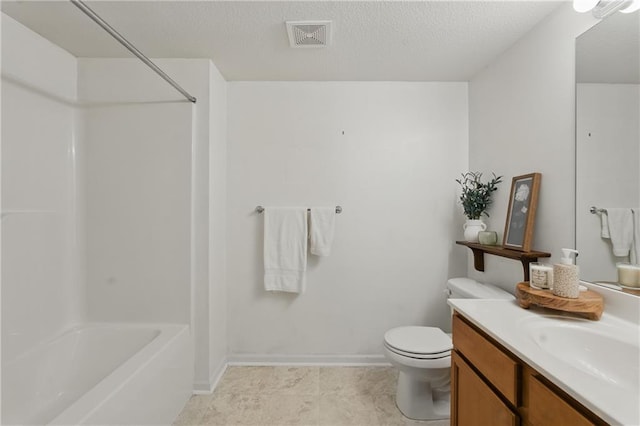 5610 NE 80th Ter Unit 1D, Kansas City, MO 64119 - full bathroom featuring vanity, toilet, shower / tub combination, baseboards, and a textured ceiling