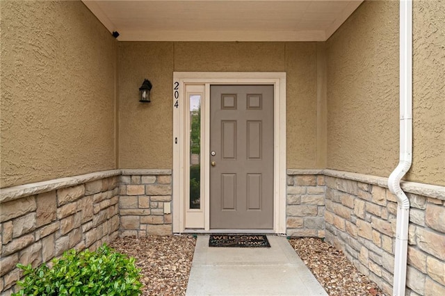 16059 Fontana St Unit 204, Overland Park, KS 66085 - property entrance with stucco siding and stone siding
