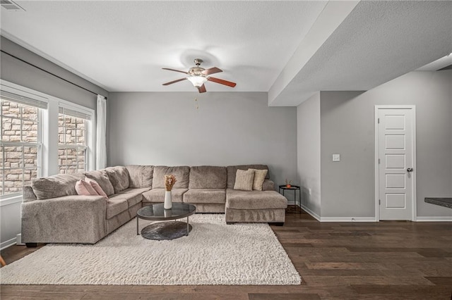 16059 Fontana St Unit 204, Overland Park, KS 66085 - living room featuring dark wood-style floors, ceiling fan, and baseboards