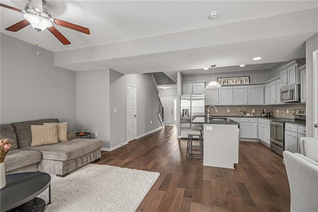 16059 Fontana St Unit 204, Overland Park, KS 66085 - living room with a ceiling fan, dark wood-type flooring, baseboards, and recessed lighting
