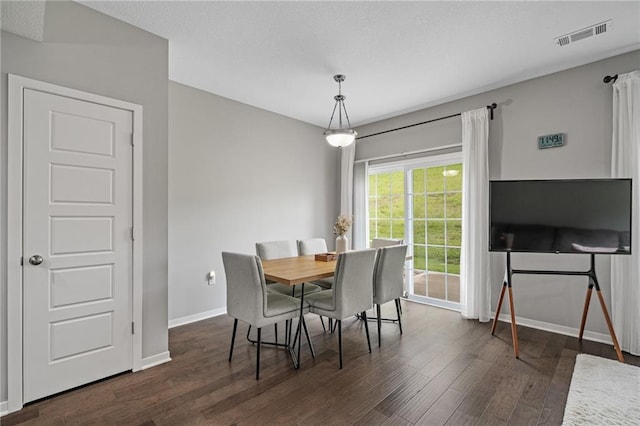 16059 Fontana St Unit 204, Overland Park, KS 66085 - dining room with dark wood finished floors and baseboards