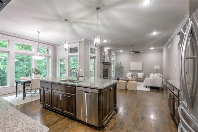 14095 NW 60th Ct, Parkville, MO 64152 - kitchen featuring stainless steel appliances, ceiling fan, dark brown cabinetry, dark wood-style flooring, and ornamental molding