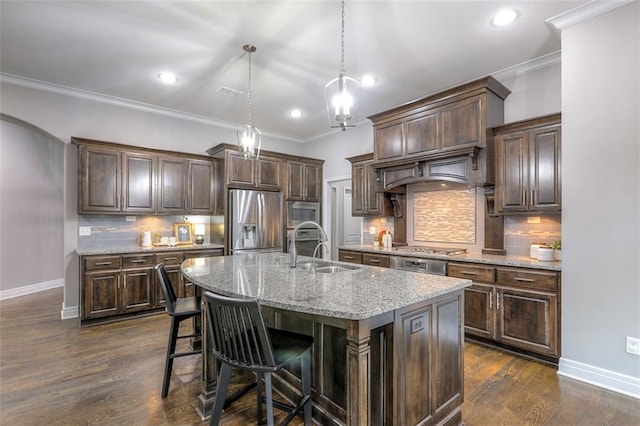 14095 NW 60th Ct, Parkville, MO 64152 - kitchen featuring stainless steel appliances, tasteful backsplash, dark brown cabinets, recessed lighting, and crown molding