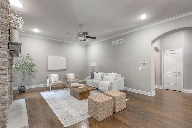 14095 NW 60th Ct, Parkville, MO 64152 - living area with arched walkways, a ceiling fan, wood finished floors, crown molding, and recessed lighting