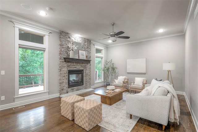 14095 NW 60th Ct, Parkville, MO 64152 - living room featuring wood finished floors, a ceiling fan, a fireplace, ornamental molding, and recessed lighting