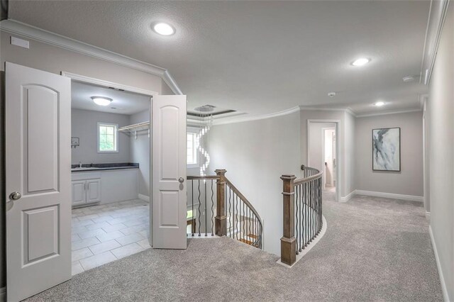 14095 NW 60th Ct, Parkville, MO 64152 - hall featuring an upstairs landing, carpet, crown molding, recessed lighting, and a textured ceiling