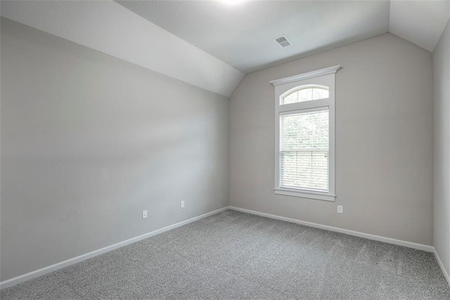 14095 NW 60th Ct, Parkville, MO 64152 - additional living space featuring vaulted ceiling and carpet floors
