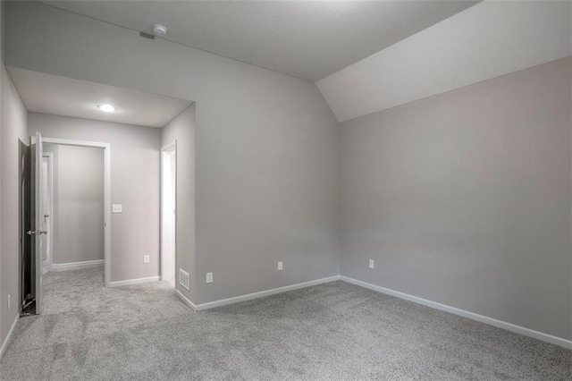 14095 NW 60th Ct, Parkville, MO 64152 - additional living space with carpet and vaulted ceiling