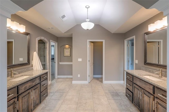 14095 NW 60th Ct, Parkville, MO 64152 - bathroom featuring two vanities, lofted ceiling, and tile patterned flooring