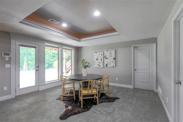 14095 NW 60th Ct, Parkville, MO 64152 - carpeted dining room featuring a raised ceiling, a textured ceiling, and recessed lighting