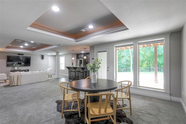 14095 NW 60th Ct, Parkville, MO 64152 - carpeted dining space with a tray ceiling, decorative columns, ornamental molding, and recessed lighting