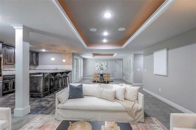 14095 NW 60th Ct, Parkville, MO 64152 - living room with a tray ceiling, ornamental molding, and recessed lighting