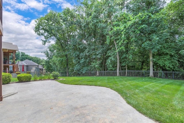 14095 NW 60th Ct, Parkville, MO 64152 - fenced backyard featuring a patio