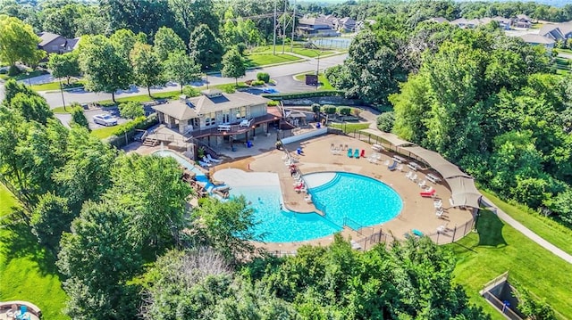 14095 NW 60th Ct, Parkville, MO 64152 - bird's eye view of a pool area and a tree filled landscape