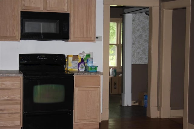45 SW 675th Rd, Warrensburg, MO 64093 - kitchen with black appliances and light brown cabinetry