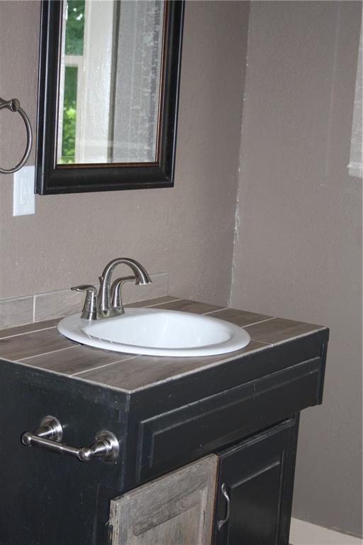45 SW 675th Rd, Warrensburg, MO 64093 - bathroom with vanity