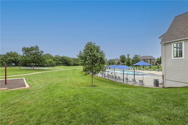 16488 S Summertree Ln, Olathe, KS 66062 - view of yard with a community pool and a patio