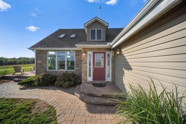 2640 Union Rd, Lawrence, KS 66044 - entrance to property featuring stone siding and a shingled roof